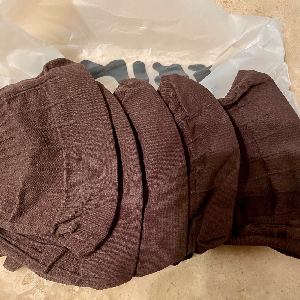 Skims brown face mask